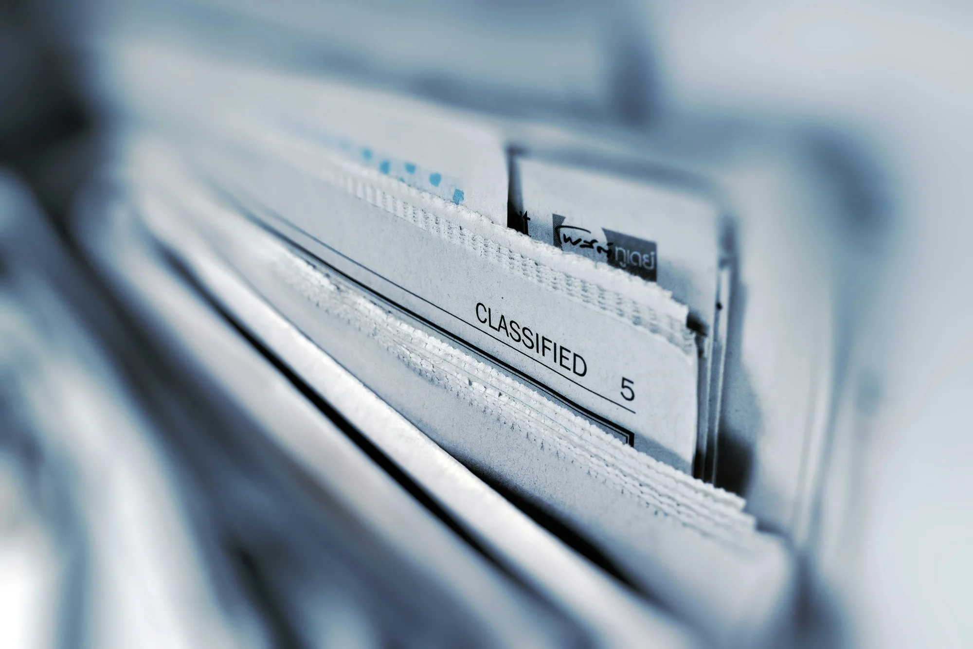 Close-up of a confidential document file labeled CLASSIFIED representing secure enterprise data